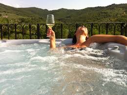 Wine magic - lady in a pool with fine wine.